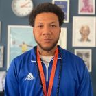 <div class="uk-background-muted uk-flex uk-flex-middle uk-flex-center uk-flex-column"><i class="uk-text-muted" uk-icon="user"></i>Aaron J-H</div>